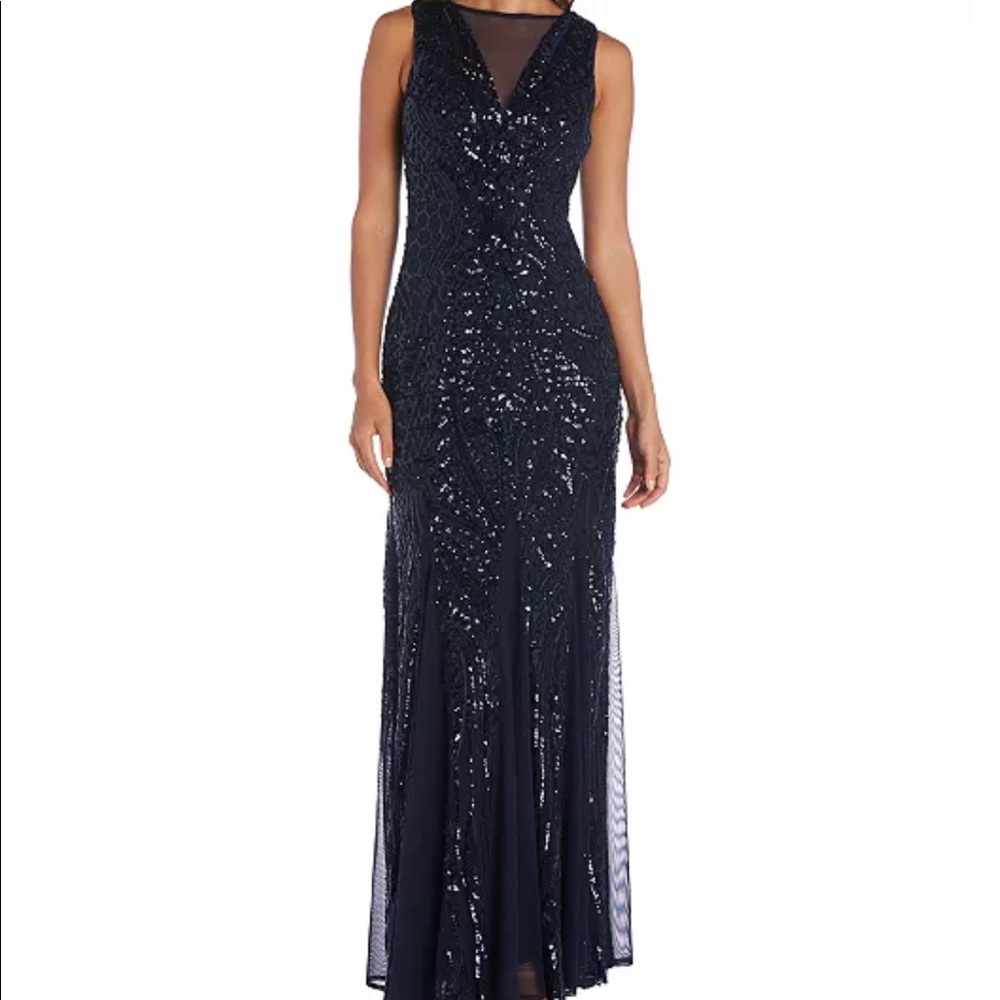 Floor length navy blue dress.